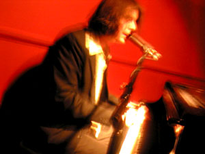 Powhida at piano.